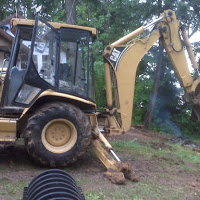 What is it about backhoes and other large machinery that get