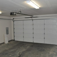 Finished garage and garage door.